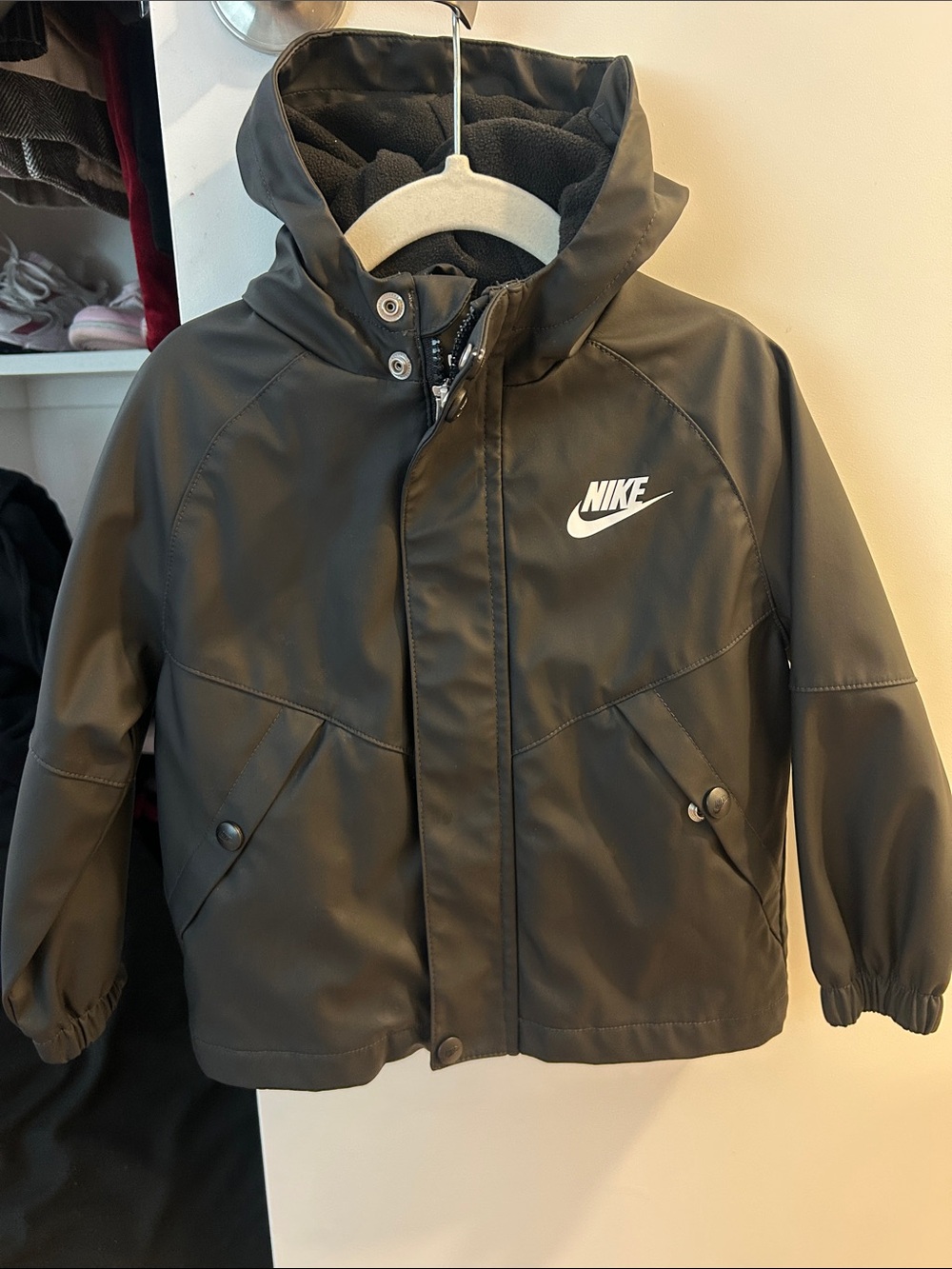 Nike Kids Black Hooded Rain Jacket with White Logo
